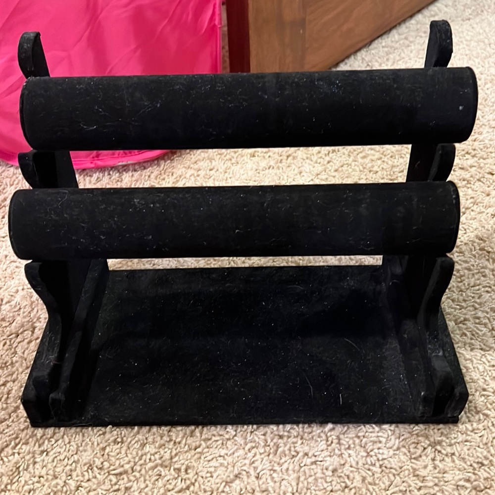 Velvet black scrunchie holder. Two rings. Needs cleaning. One side needs glue